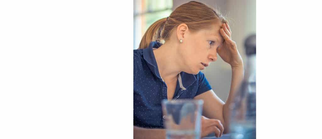 Frustrated woman mental roadblock