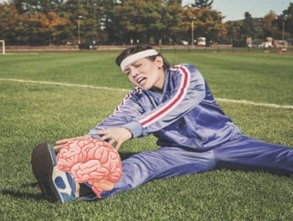 Brain benefits from exercise as woman exercises a brain by her leg