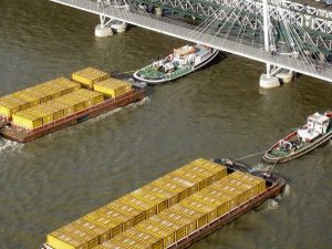 tug boats and barges, like the ones in US v Carroll Towing