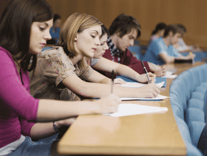 Law students in classroom taking notes