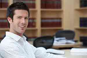 Student smiling in library